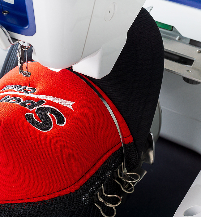 Close-up of embroidery machine creating detailed custom design